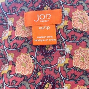 Multi-colored button down women’s blouse, size XS